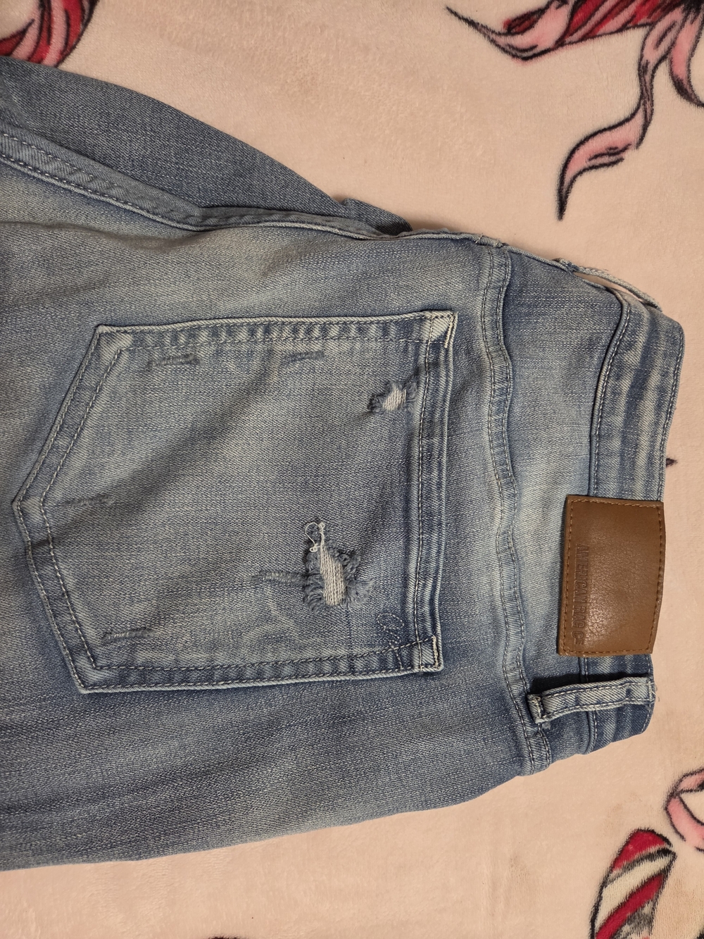 Juniors American Rag Light Wash Slim Straight Jeans with Distressed Pocket